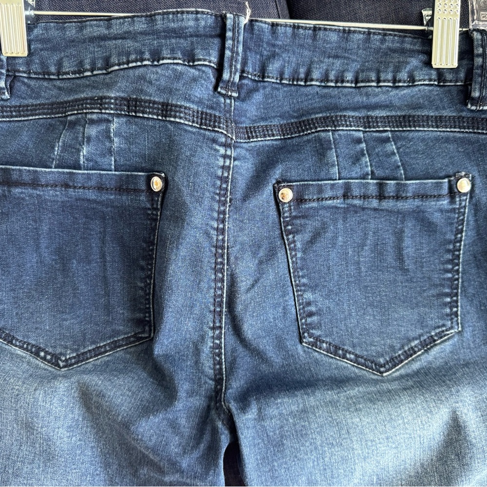 Skinny  and stretchy dark denim jeans.